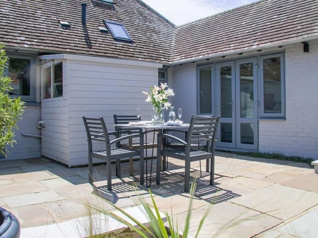 The West Wittering bungalow is just steps from the beach