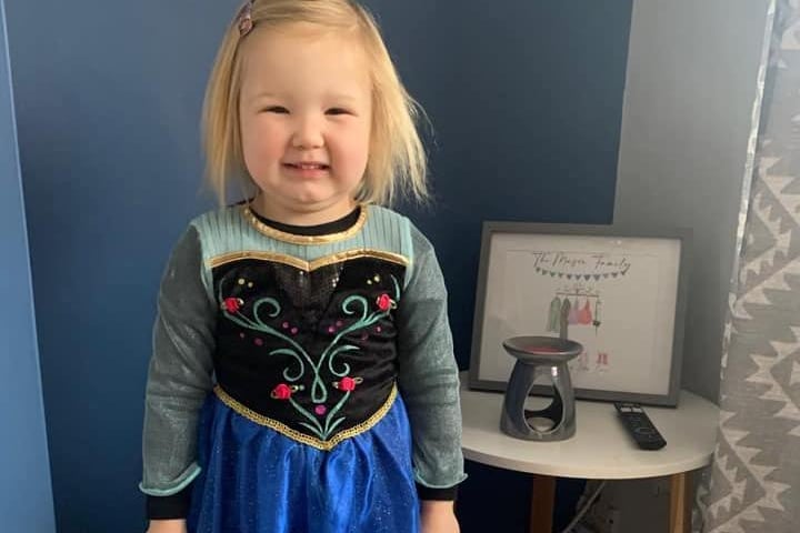 Sweet little Eden is dressed up as Disney princess, Anna, from Frozen.