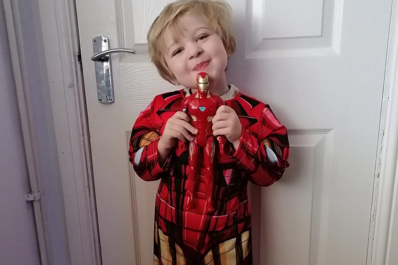 Little super hero Harley is dressed up to save the world as Iron Man.