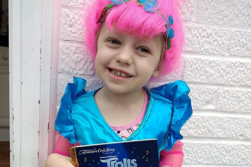 There's something a little different about Amelia today as she turned her hair pink to become Queen Poppy from Trolls.