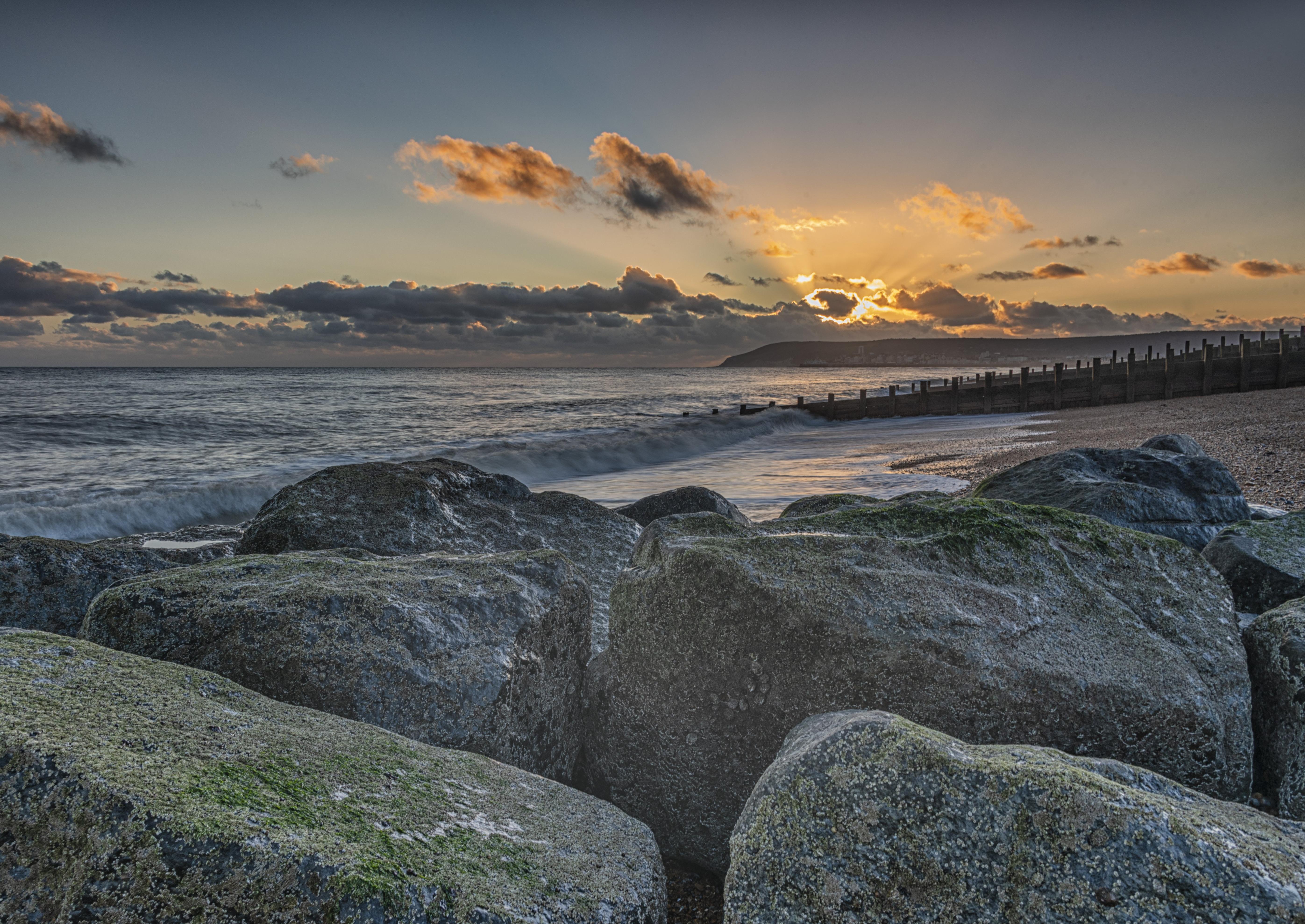 Sunset at Eastbourne beach, looking west from Langney Point to the town and Beachy Head. This atmospheric photograph was taken by Thomas Robinson, who lives in Eastbourne. SUS-210317-093909001