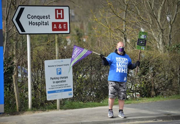 Pay protest outside the Conquest Hospital in Hastings. SUS-210104-133115001