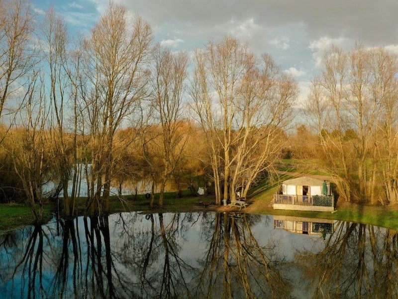 Grendon Lakes is a family owned camping and glamping site in the heart of rural
Northamptonshire, just a short drive from Northampton and Wellingborough.
Surrounded by nature and with glorious countryside views, camping here is incredibly relaxing and great fun. An excellent location for adventurous couples, families, family and friend groups. Plenty of space for everyone to enjoy with lakeside yurts, electric pitches, lakeside pitches, fishing pitches and even private fields and a glamping village available to hire later in the year for larger gatherings. The lakeside yurts offer comfortable beds, cosy duvets, fairy lights, cooking equipment, fridges and outdoor seating. Fishing and stunning views from lakeside decks are also included in every yurt stay. Activities on site keep everyone from the grandparents to the little ones entertained; aqua park, paintball, fishing, paddle boarding, long country walks across fields reaching nature reserves and country parks. The site is also dog friendly.