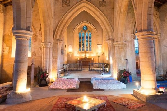 An unforgettable sleepover in a medieval church. Church camping, or ‘Champing’ began from the quiet village of Aldwincle, one of Northamptonshire’s hidden gems. You arrive to find your camping beds and chairs set up along with tea and coffee making provisions. You have sole use of the church, so it’s only you and your friends or family staying the night. Lanterns and fairy lights are also set out, as All Saints doesn’t have a power supply, giving you the chance for a complete get-away amongst the cosy setting of glorious limestone arcades and pillars. You’ll have a sound night’s sleep, surrounded by solid walls and a robust roof, recently repaired, made possible by a grant awarded by the Cultural Recovery Fund for Heritage. In the morning, you can even order a hot breakfast, cooked and delivered to your church door. The large open interior is perfect for a weekend adventure with friends, special occasion celebrations with the whole family gathered together, or for those simply seeking the comfort an ancient s