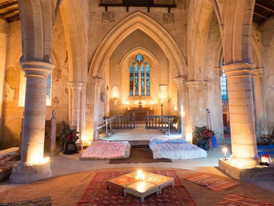 An unforgettable sleepover in a medieval church. Church camping, or ‘Champing’ began from the quiet village of Aldwincle, one of Northamptonshire’s hidden gems. You arrive to find your camping beds and chairs set up along with tea and coffee making provisions. You have sole use of the church, so it’s only you and your friends or family staying the night. Lanterns and fairy lights are also set out, as All Saints doesn’t have a power supply, giving you the chance for a complete get-away amongst the cosy setting of glorious limestone arcades and pillars. You’ll have a sound night’s sleep, surrounded by solid walls and a robust roof, recently repaired, made possible by a grant awarded by the Cultural Recovery Fund for Heritage. In the morning, you can even order a hot breakfast, cooked and delivered to your church door. The large open interior is perfect for a weekend adventure with friends, special occasion celebrations with the whole family gathered together, or for those simply seeking the comfort an ancient s
