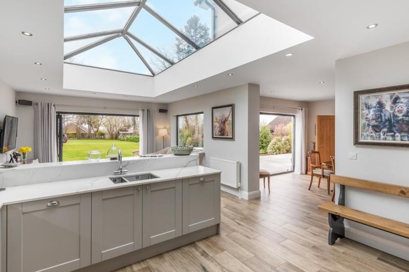 The kitchen area has been stylishly fitted with Regency Shaker style units