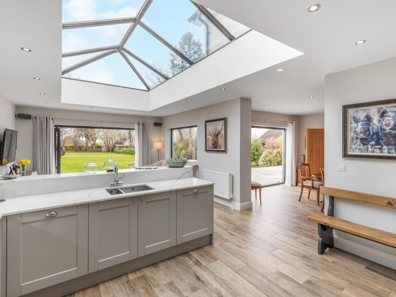 The kitchen area has been stylishly fitted with Regency Shaker style units