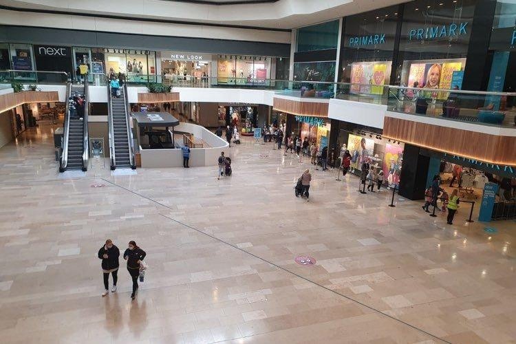 Shoppers in Queensgate, and the queues for Primark