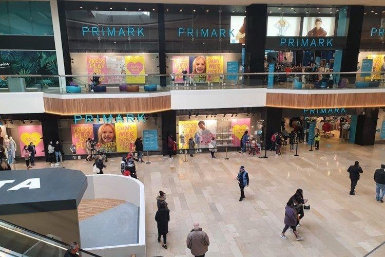 Shoppers in Queensgate, and the queues for Primark