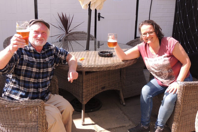 Bob and Rachel were the first customers at the Three Kings Inn in Threekingham when it reopened its doors on Tuesday. Bob said: "it's good to get back to some sort of normality and talk to people. It's fantastic for the pubs too. EMN-210413-153822001