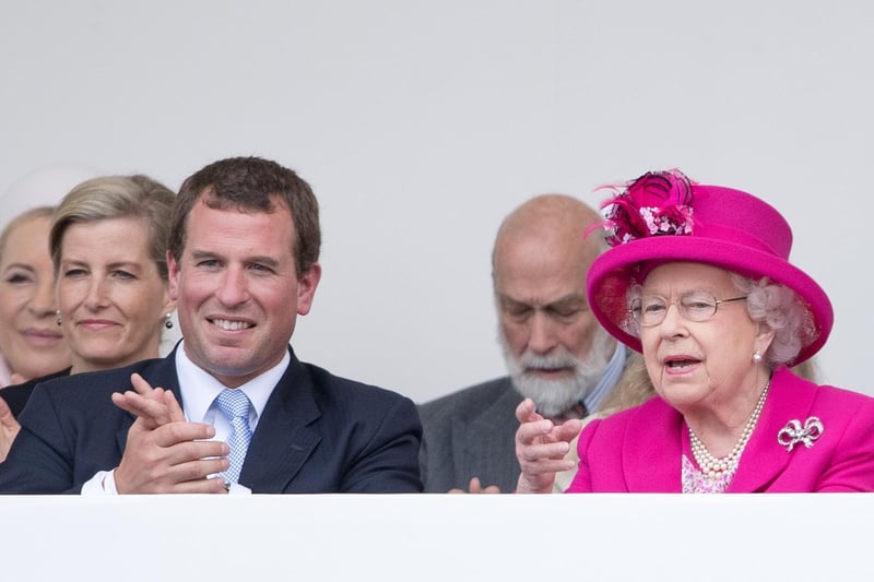 The Queen and Prince Philip's grandson. He is the eldest child and only son of Anne, Princess Royal, and her first husband, Captain Mark Phillips. Pictured here in 2016 with his grandma, the Queen. Photo by Jeff Spicer/Getty Images