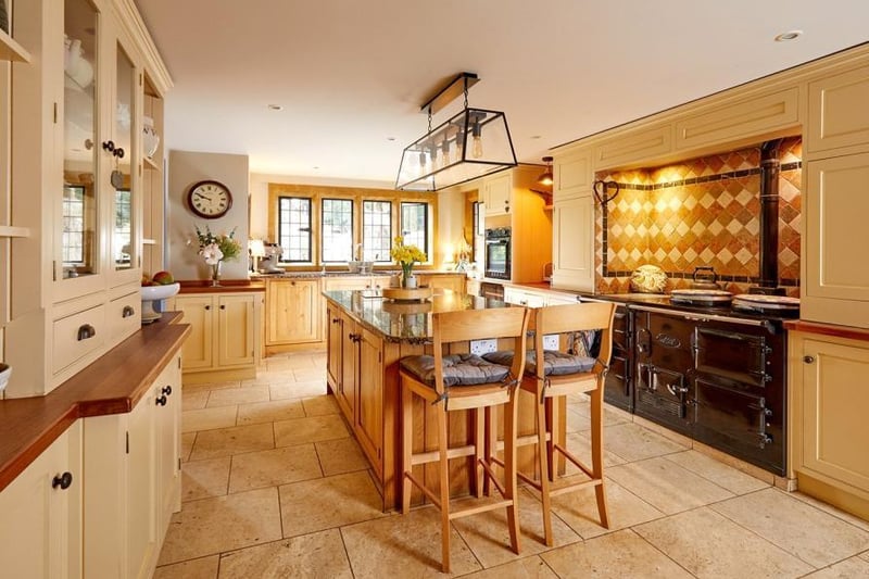 The kitchen inside the stone built period home on the market in Thorpe Mandeville (Image from Rightmove)