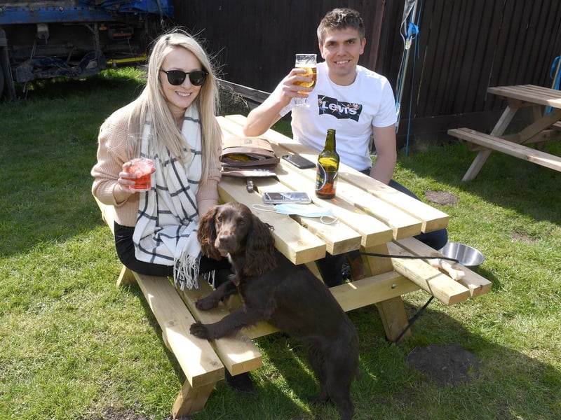 Coach and Horses, Billinghay. Shane and Hannah Rawlings with dog, Ruby. EMN-210419-092850001