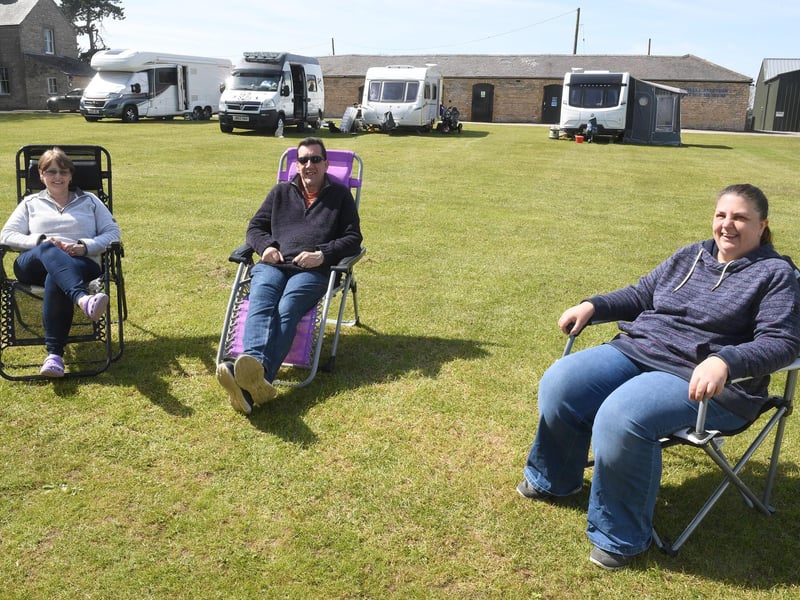 Heath Farm Caravan Site, Rauceby. L-R Paul and Julie Thornhill with Zoe Fox. EMN-210419-093037001