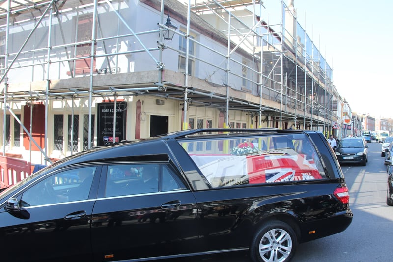 Crowds gathered outside The Rose and Crown pub in Worthing to pay their respects