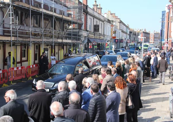 Crowds gathered outside The Rose and Crown pub in Worthing to pay their respects