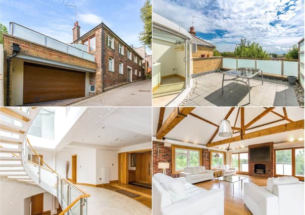This modern house with office, cinema bar and two roof terraces, is on the market for £1,650,000