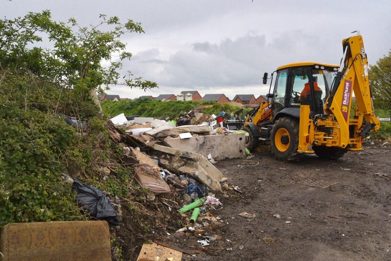 Work starts to clear the rubbish
