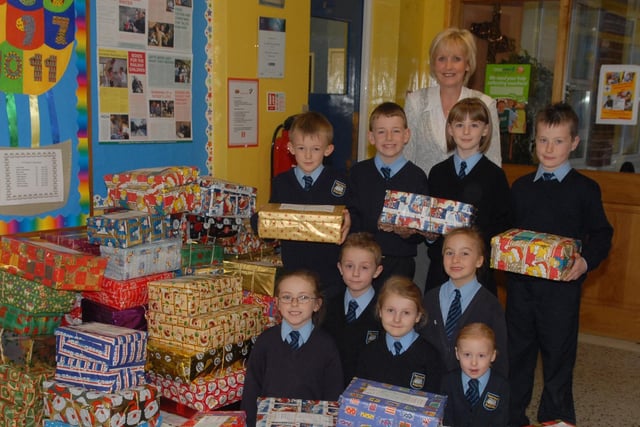 Class representatives from St Johns Primary School Gilford along with some of the shoe boxes which the school has collected for the Blytheswood Appea in 2007l. Included is school co ordinator Mrs Patricia Derby