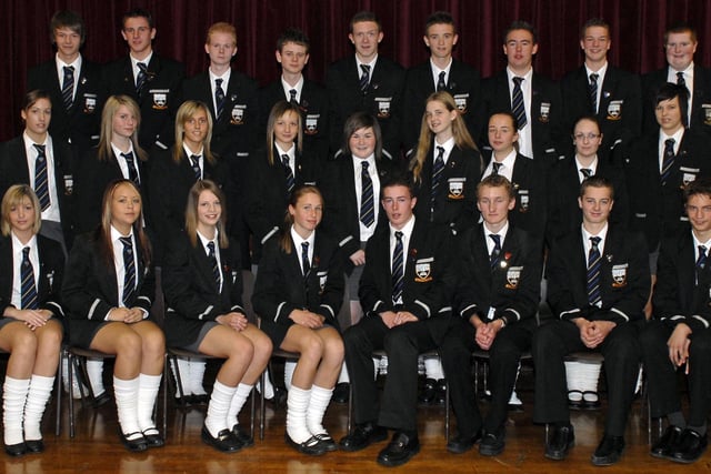 The new prefect and head pupils at Markethill High School in 2007 pictured with principal Mr San Loughrey, left and head of prefects Mr Colin Baxter