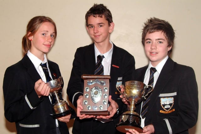 Trophy winners at the Markethill High School Junior Prize Day in 2007, from left, Emma Alderdice, The Webster Cup for Athletics, Adam Murray with the Stewart Shield for Attendance he received on behalf of 9A1 and Samuel Hughes with The Henry James Memorial Cup for Fund Raising
