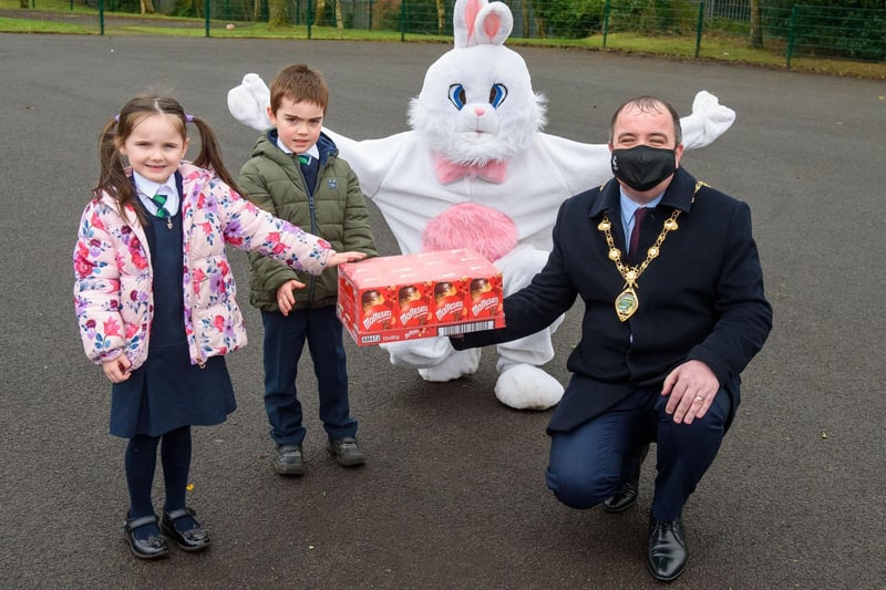 Derry City and Strabane District Council Mayor, Councillor Brian Tierney, accompanied by special guest, the Easter Bunny, pictured during a visit to St.Patrickâ€TMs Primary School Pennyburn Primary School where he presented Easter Eggs and commended the pupils on their contribution to a Mayoral art Competition. Picture Martin McKeown. 29.03.21