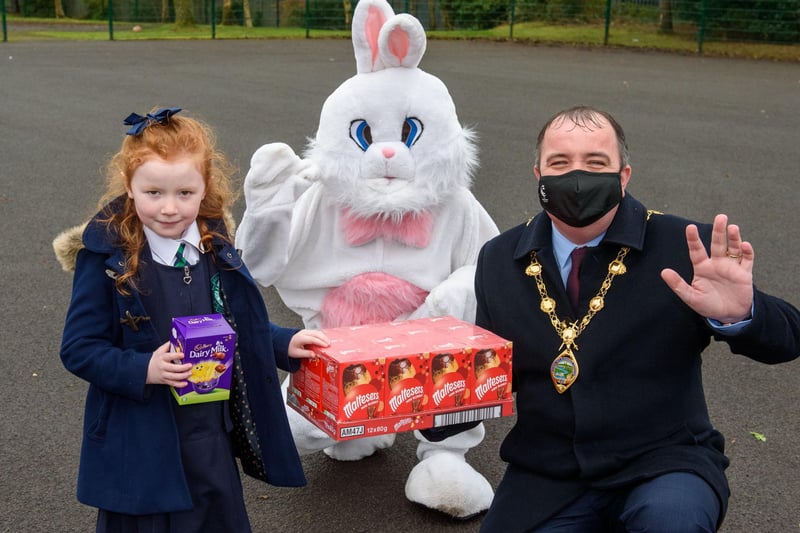 Derry City and Strabane District Council Mayor, Councillor Brian Tierney, accompanied by special guest, the Easter Bunny, pictured during a visit to St.Patrickâ€TMs Primary School Pennyburn Primary School where he presented Easter Eggs and commended the pupils on their contribution to a Mayoral art Competition. Picture Martin McKeown. 29.03.21