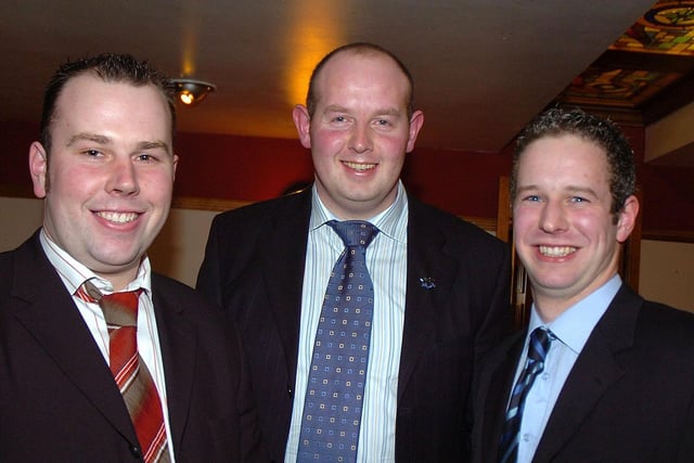 Adrian Cooper (centre) who was special guest at the Moneymore Young Farmers annual dinner dance in 2007. Also are Kyle Campton (club president) and Philip Keatley (club leader).