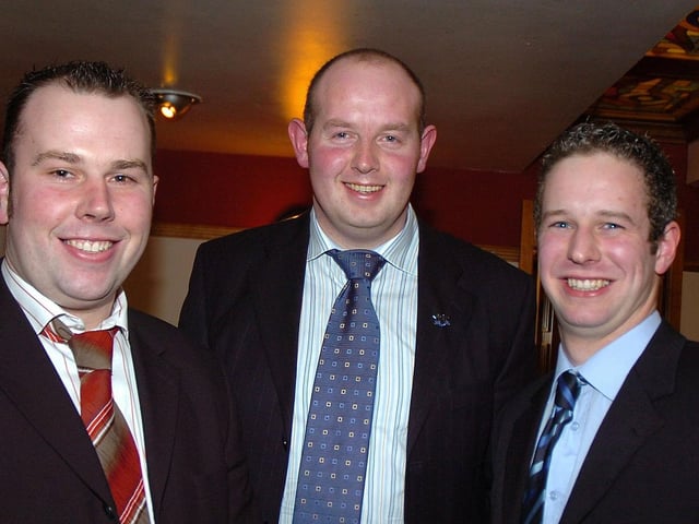 Adrian Cooper (centre) who was special guest at the Moneymore Young Farmers annual dinner dance in 2007. Also are Kyle Campton (club president) and Philip Keatley (club leader).