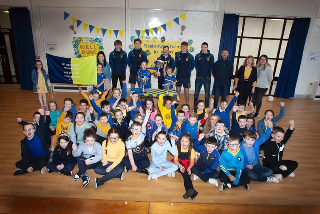 Steelstown's Primary Schools' 4 boys and girls delighted to welcome the All-Ireland heroes last week. (Photo: Jim McCafferty)
