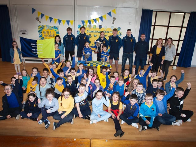 Steelstown's Primary Schools' 4 boys and girls delighted to welcome the All-Ireland heroes last week. (Photo: Jim McCafferty)