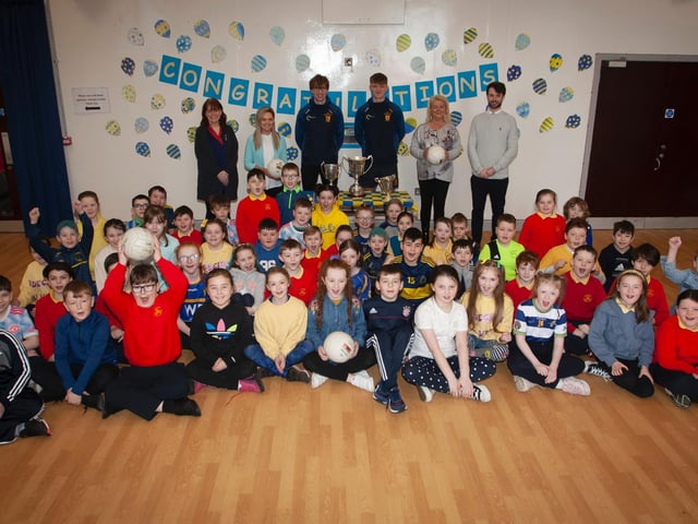 Steelstown's Primary 5 staff and children delighted to have their heroes and former pupils, Cahir McMonagle and Oran Fox, back in their own Primary School.