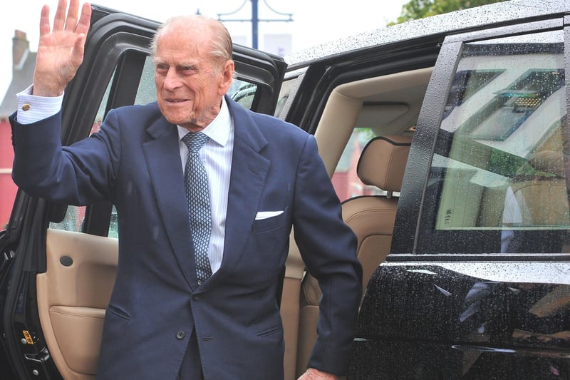 COLERAINE, NORTHERN IRELAND - JUNE 25:  (EDITORIAL USE ONLY, NO SALES) In this handout image provided by Harrison Photography, Prince Philip, Duke of Edinburgh waves as he arrives to attend a service at the war memorial on June 25, 2014 in Coleraine, Northern Ireland. The Royal party are visiting Northern Ireland for three days.  (Photo by simon graham/Harrison Photography via Getty Images)