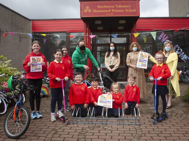 Pupil representatives from Steelstown Primary School pictured last week with their â€ ̃Big Pedalâ€TM prizes. (Photos: Jim McCafferty Photography)
