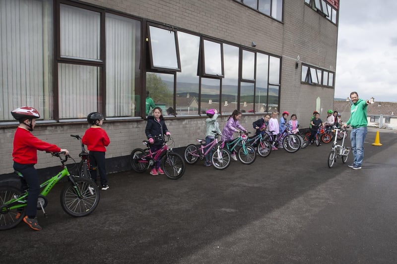 Richard Farrow delivers the â€ ̃Cycle Skillsâ€TM session to Steelstown Primary School Key Stage 1 pupils last week
