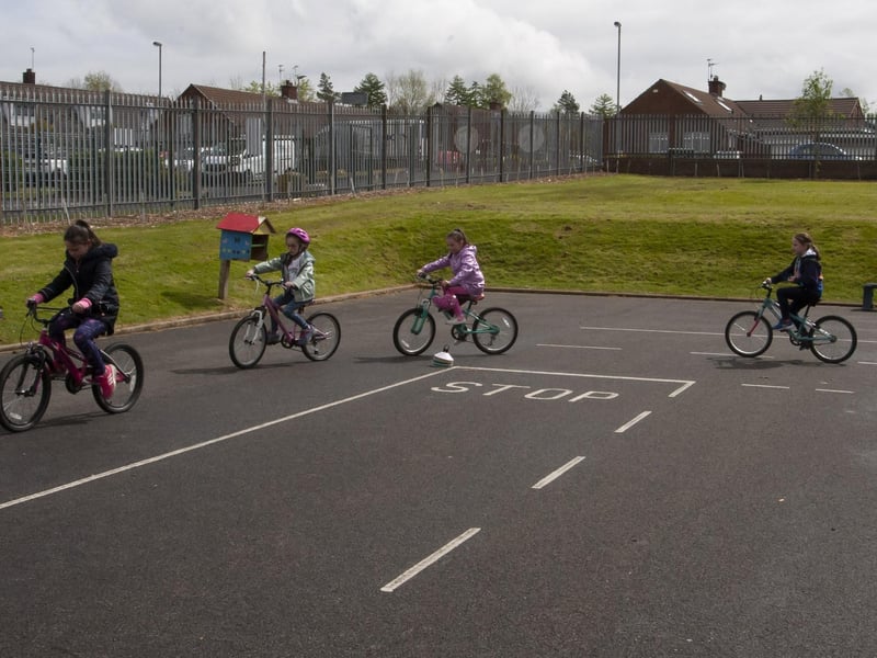 Steelstown Primary School pupils listen carefully to Richard Farrowâ€TMs instructions during their †̃Cycle Skillsâ€TM session.