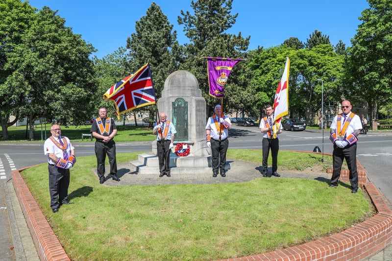 District Worshipful Master Bro Stephen Law, District Chaplain Rev Peter Blake & Deputy District Master Paul Graham with the District Colour Party at Hilden War Memorial. Pic by Norman Briggs, rnbphotographyni