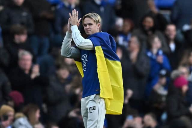 Chelsea's new signing, Chelsea's Ukrainian midfielder Mykhailo Mudryk is introduced to the crowd at half-time in the English Premier League football match between Chelsea and Crystal Palace at Stamford Bridge in London on January 15, 2023.(Photo by BEN STANSALL/AFP via Getty Images)