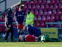 Grant Leadbitter receives treatment at Gresty Road