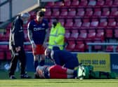 Grant Leadbitter receives treatment at Gresty Road