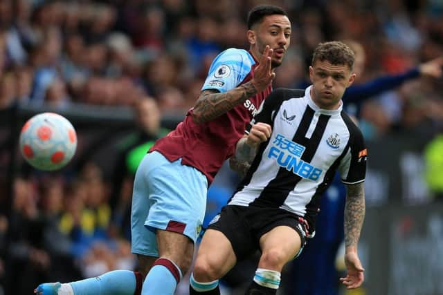 Newcastle United's English defender Kieran Trippier (R) vies with Burnley's English midfielder Dwight McNeil (L) during the English Premier League football match between Burnley and Newcastle United at Turf Moor in Burnley, north west England on May 22, 2022. (Photo by LINDSEY PARNABY/AFP via Getty Images)