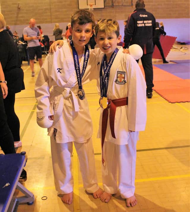 Isaac Hall age 12 and Ewan Baxter age 10 after their final.