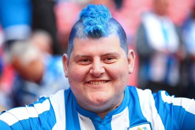 Huddersfield Town play in the Championship and have an average attendance of 18,598.