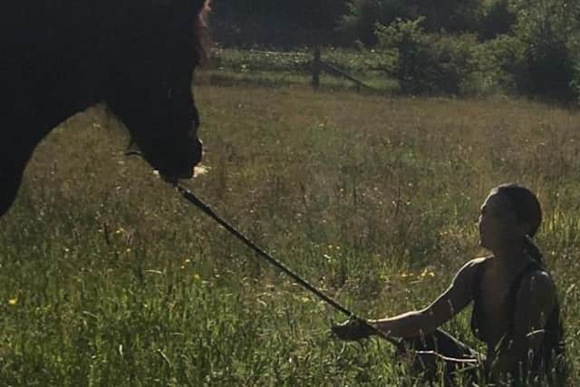 Karen Bulman pictured with her other horse.