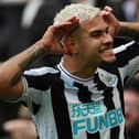 Bruno Guimaraes celebrates his goal against Brentford last weekend in a FUN88-branded Newcastle United shirt.