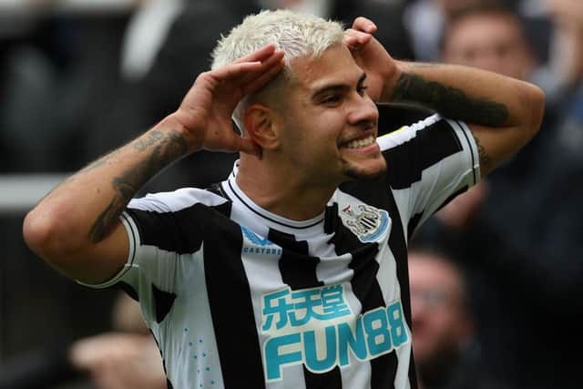 Bruno Guimaraes celebrates his goal against Brentford last weekend in a FUN88-branded Newcastle United shirt.