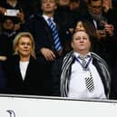 Newcastle United owner Mike Ashley (C), Linda Ashley (L) and managing director Lee Charnley (R) look on from the stand prior to the Barclays Premier League match between Tottenham Hotspur and Newcastle United at White Hart Lane on December 13, 2015 in London, England.