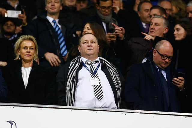 Newcastle United owner Mike Ashley (C), Linda Ashley (L) and managing director Lee Charnley (R) look on from the stand prior to the Barclays Premier League match between Tottenham Hotspur and Newcastle United at White Hart Lane on December 13, 2015 in London, England.