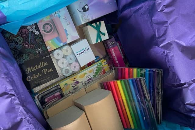 22 employees from the Amazon fulfilment centre in Gateshead recently volunteered to pack activity boxes for Dragonfly Cancer Trust