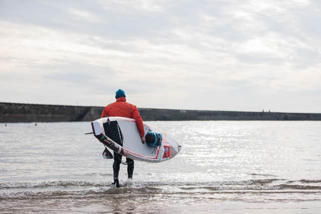 Brendon Prince heads back into the water at Seaham Harbour for the next leg of The Long Paddle